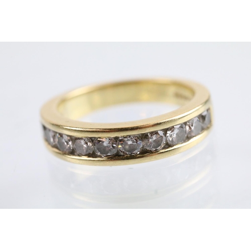 8 - 18ct gold and diamond half eternity ring set set with ten round brilliant cut diamonds, estimated ap... 