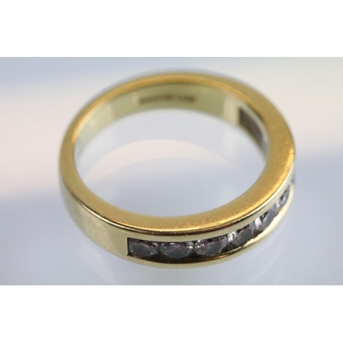 8 - 18ct gold and diamond half eternity ring set set with ten round brilliant cut diamonds, estimated ap... 