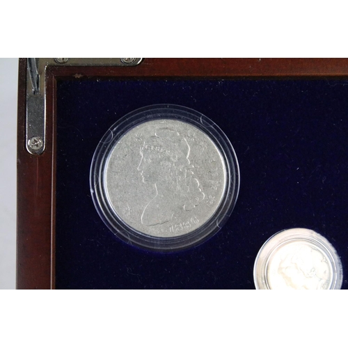 102 - A set of early american silver coins encapsulated within wooden fitted display case.