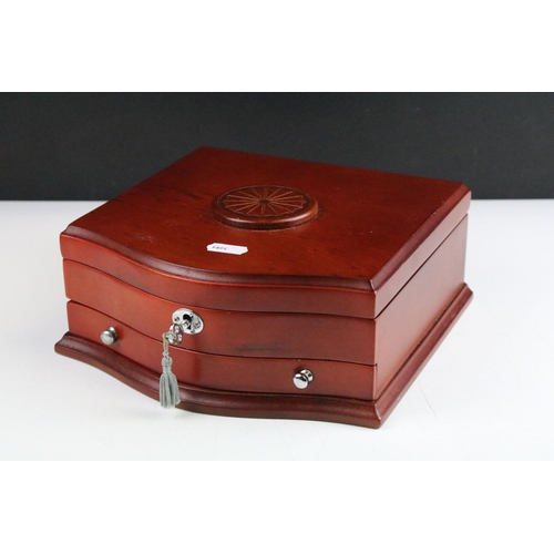 102 - A set of early american silver coins encapsulated within wooden fitted display case.