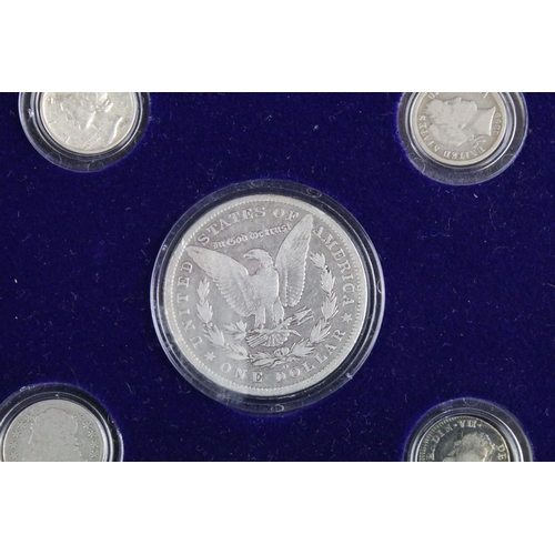 102 - A set of early american silver coins encapsulated within wooden fitted display case.