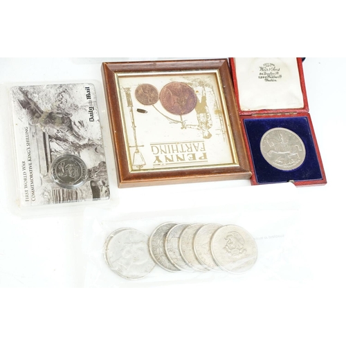 127 - A collection of mixed coins to include commemorative crowns, coin packs...etc.. to include silver ex... 