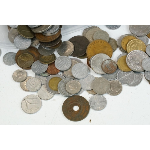 21 - A collection of mixed World coins to include some silver examples.