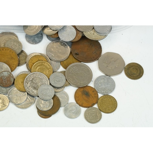 21 - A collection of mixed World coins to include some silver examples.