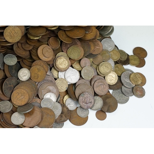 23 - A large collection of British pre decimal coins to include pennies, half pennies, threepences, shill... 