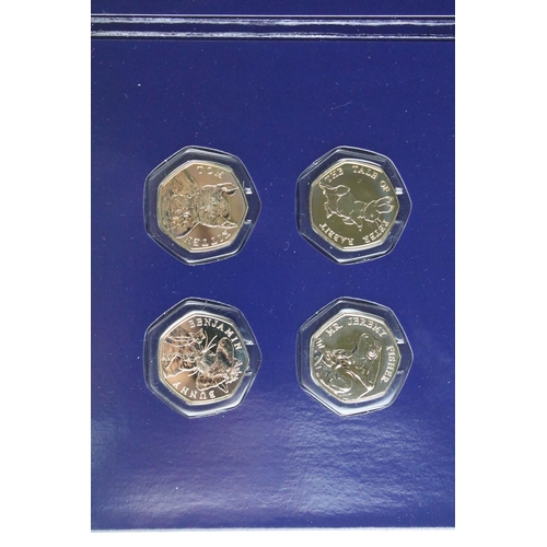 75 - A collection of uncirculated and proof like coins to include the Royal Mint 2022 year set, Beatrix P... 