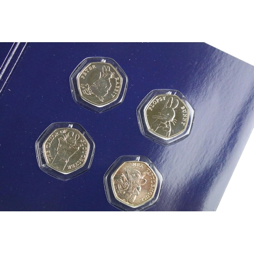 75 - A collection of uncirculated and proof like coins to include the Royal Mint 2022 year set, Beatrix P... 