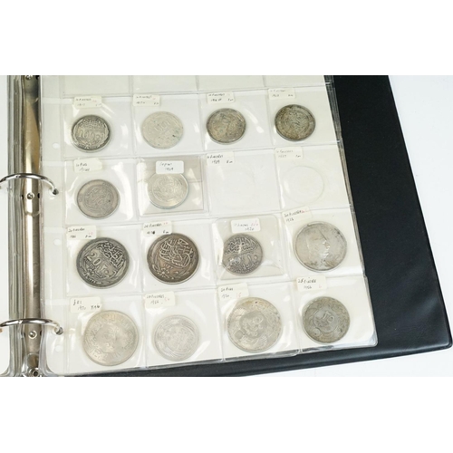 83 - A good collection of Egyptian coins to include early and silver examples contained within a collecto... 