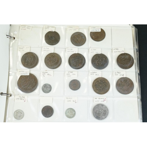 83 - A good collection of Egyptian coins to include early and silver examples contained within a collecto... 