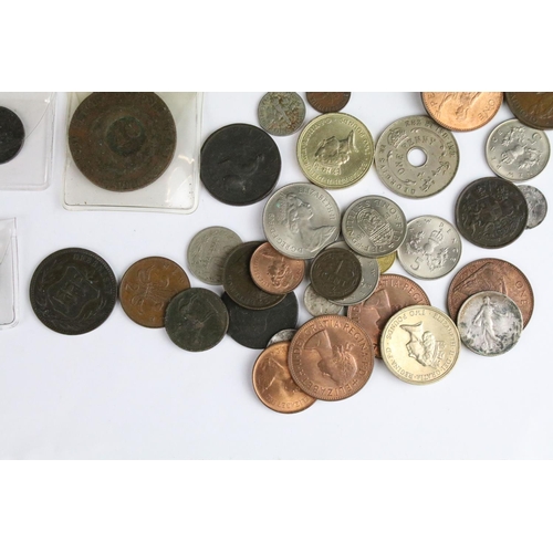 97 - A small collection of British pre decimal and World coins to include early milled and silver example... 