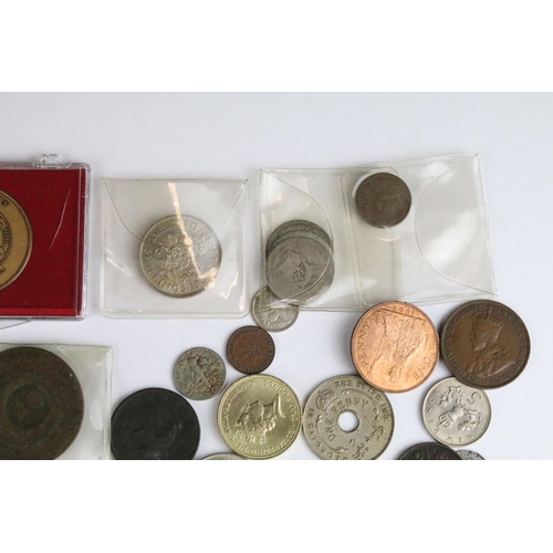 97 - A small collection of British pre decimal and World coins to include early milled and silver example... 