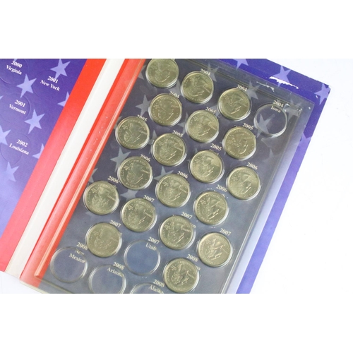 100 - A small collection of United States of America coins to include uncirculated examples together with ... 