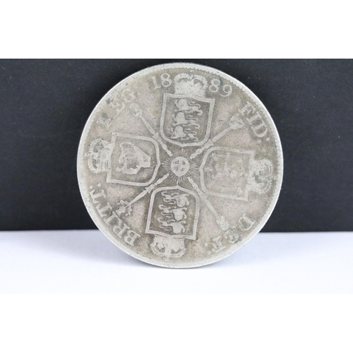 108 - Two British Queen Victoria pre decimal silver double florin coins to include 1887 and 1889 examples.