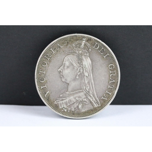 108 - Two British Queen Victoria pre decimal silver double florin coins to include 1887 and 1889 examples.