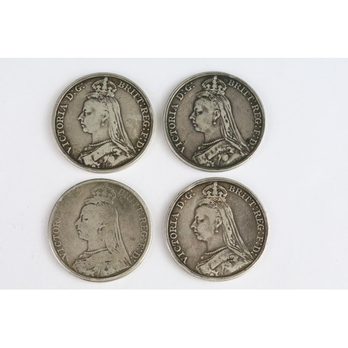 110 - A collection of four British Queen Victoria pre decimal silver full crown coins to include 1889, 189... 