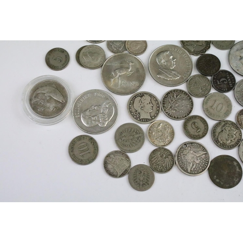 119 - A collection of circulated world silver coins to include United States, German  and India examples.