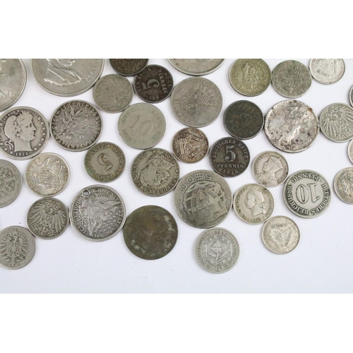 119 - A collection of circulated world silver coins to include United States, German  and India examples.