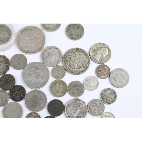 119 - A collection of circulated world silver coins to include United States, German  and India examples.