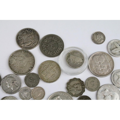 119 - A collection of circulated world silver coins to include United States, German  and India examples.