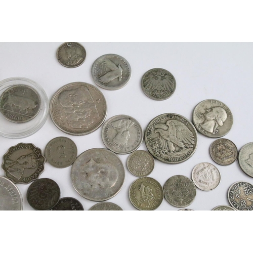 119 - A collection of circulated world silver coins to include United States, German  and India examples.