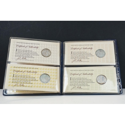 138 - A set of four sterling silver Medallic first day coin covers within a fitted collectors album