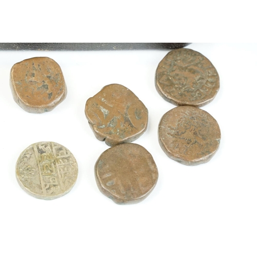 140 - A collection of early Indian hammered coins.