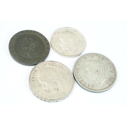 141 - A small collection of British pre decimal coins to include two silver crown coins.