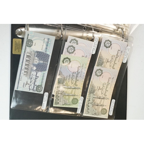 84 - A large collection of British and world banknotes contained within two folders to include a good col... 