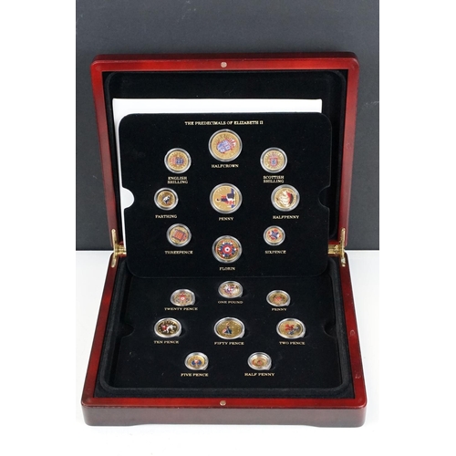 89 - Two proof like coin sets within wooden fitted cases to include 'The Decimals And Pre Decimals of Que... 