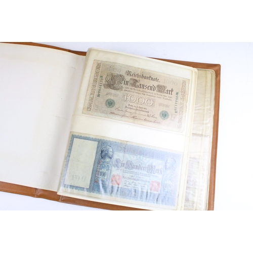 25 - A small collection of British and World banknotes contained within a collectors album.