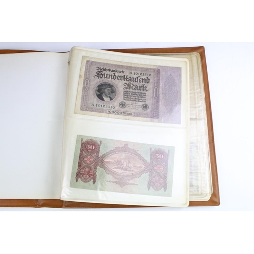 25 - A small collection of British and World banknotes contained within a collectors album.