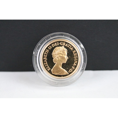 29 - A British Royal Mint Queen Elizabeth II proof 1984 gold full sovereign coin encapsulated within fitt... 