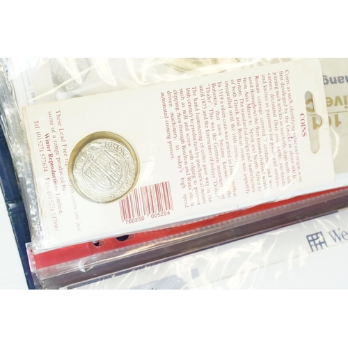 3 - A collection of British decimal collectable £2, £1 and 50p coins contained within a change checker a... 