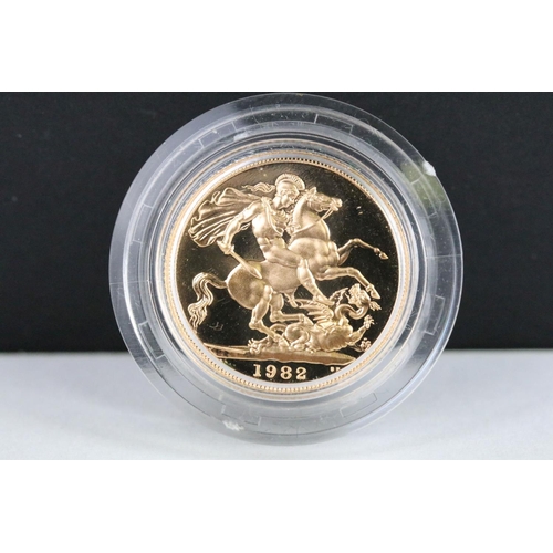 31 - A British Royal Mint Queen Elizabeth II proof 1982 gold full sovereign coin encapsulated within fitt... 