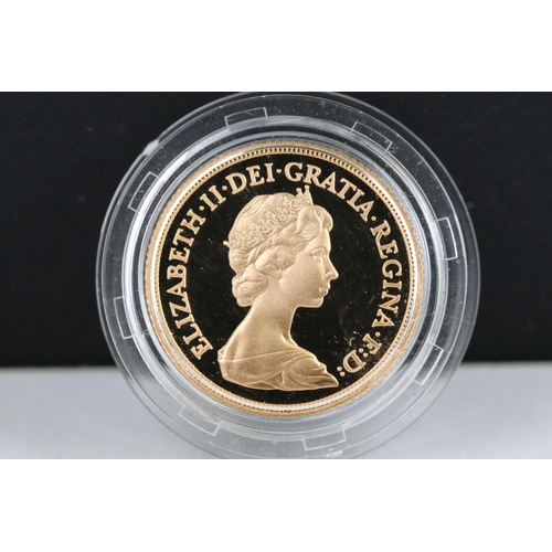 31 - A British Royal Mint Queen Elizabeth II proof 1982 gold full sovereign coin encapsulated within fitt... 