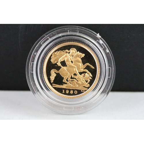 32 - A British Royal Mint Queen Elizabeth II proof 1980 gold half sovereign coin encapsulated within fitt... 