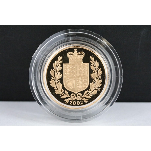 33 - A British Royal Mint Queen Elizabeth II proof 2002 gold full sovereign coin encapsulated within fitt... 