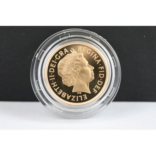 33 - A British Royal Mint Queen Elizabeth II proof 2002 gold full sovereign coin encapsulated within fitt... 