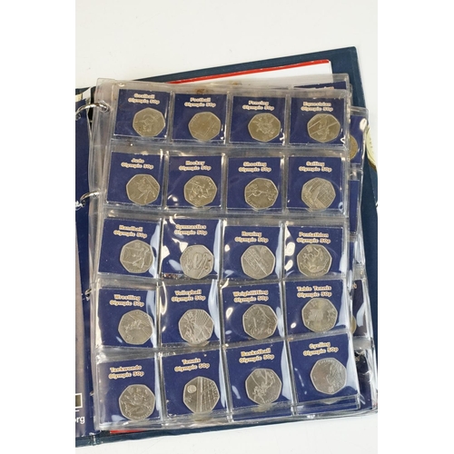 4 - A collection of British decimal collectable £2, £1 and 50p coins contained within a change checker a... 