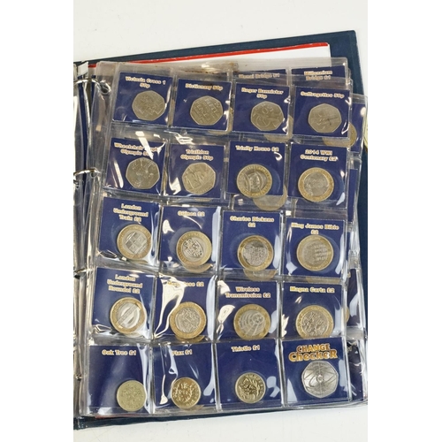 4 - A collection of British decimal collectable £2, £1 and 50p coins contained within a change checker a... 