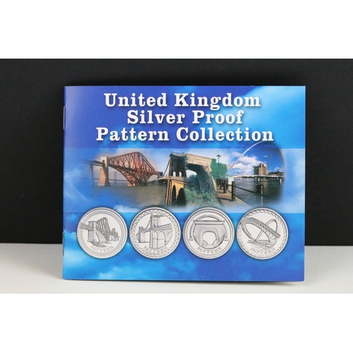 48 - A Royal Mint United Kingdom silver proof £1 four coin pattern collection encapsulted within fitted d... 