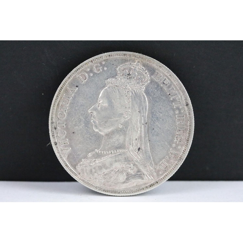 54 - A collection of three British Queen Victoria silver Crown coins to include 1890, 1887 and 1887 examp... 