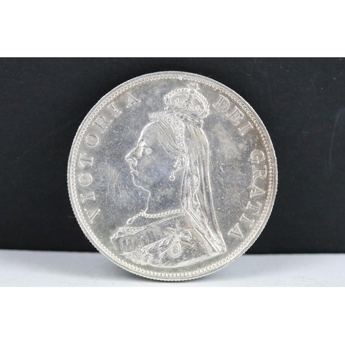 54 - A collection of three British Queen Victoria silver Crown coins to include 1890, 1887 and 1887 examp... 