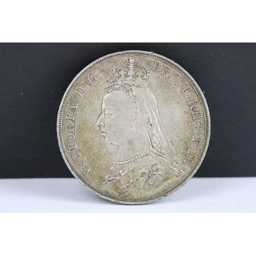 54 - A collection of three British Queen Victoria silver Crown coins to include 1890, 1887 and 1887 examp... 