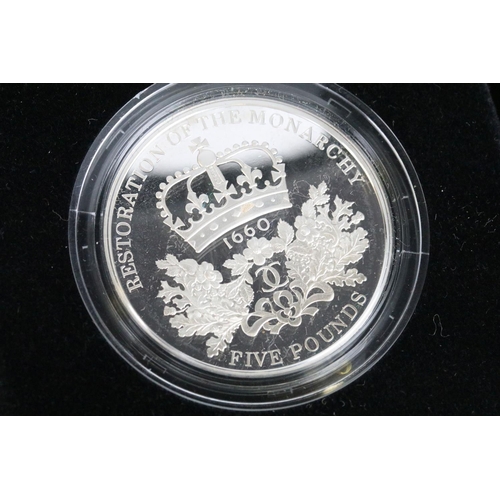 56 - A British Royal Mint 2007 Diamond Wedding silver proof crown coin together with a 2010 Restoration o... 