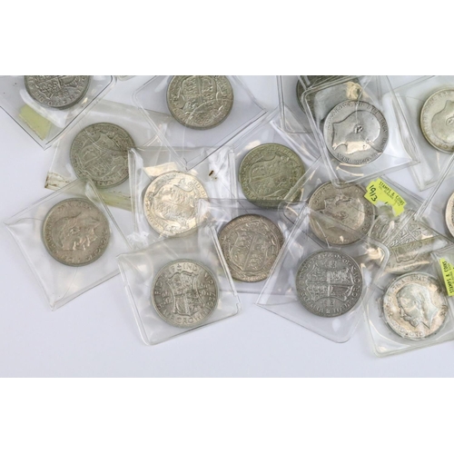 58 - A collection of twenty nine British pre decimal silver half crown coins to include pre 1947 and pre ... 