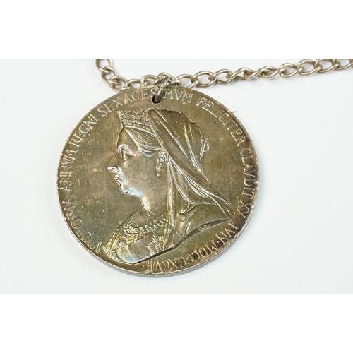 6 - A large Queen Victoria commemorative medallion mounted to white metal chain.