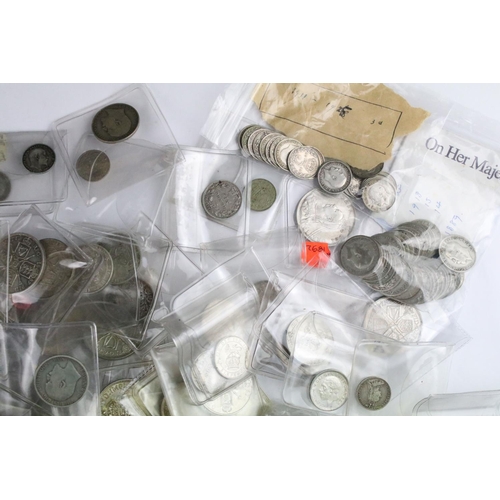 60 - A collection of British pre decimal silver pre 1947 and pre 1920 coins to include threepence, sixpen... 