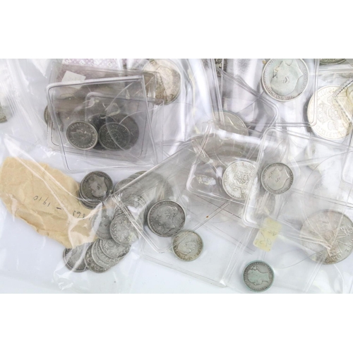 60 - A collection of British pre decimal silver pre 1947 and pre 1920 coins to include threepence, sixpen... 