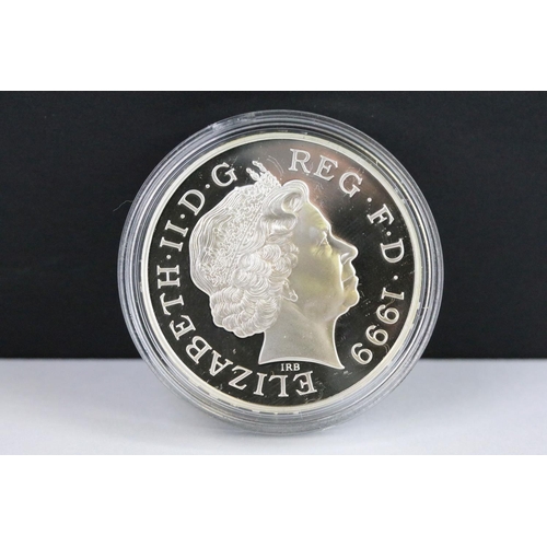 63 - A United Kingdom Royal Mint silver proof Piedfort 1988 £1 coin together with  a 2000 silver proof £5... 